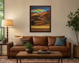 original oil painting of colorful mountains and plains with colorful clouds in sky framed in complementary wood frame, displayed over livingroom sofa