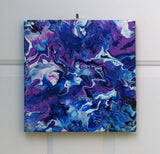 original abstract poured acrylic painting on 12x12" canvas, bright swirling purples, white and rich blues seem energetic