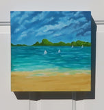 original oil painting on deep cradle canvas of turquoise ocean, sandy beach with mountins in the distance and sailboats