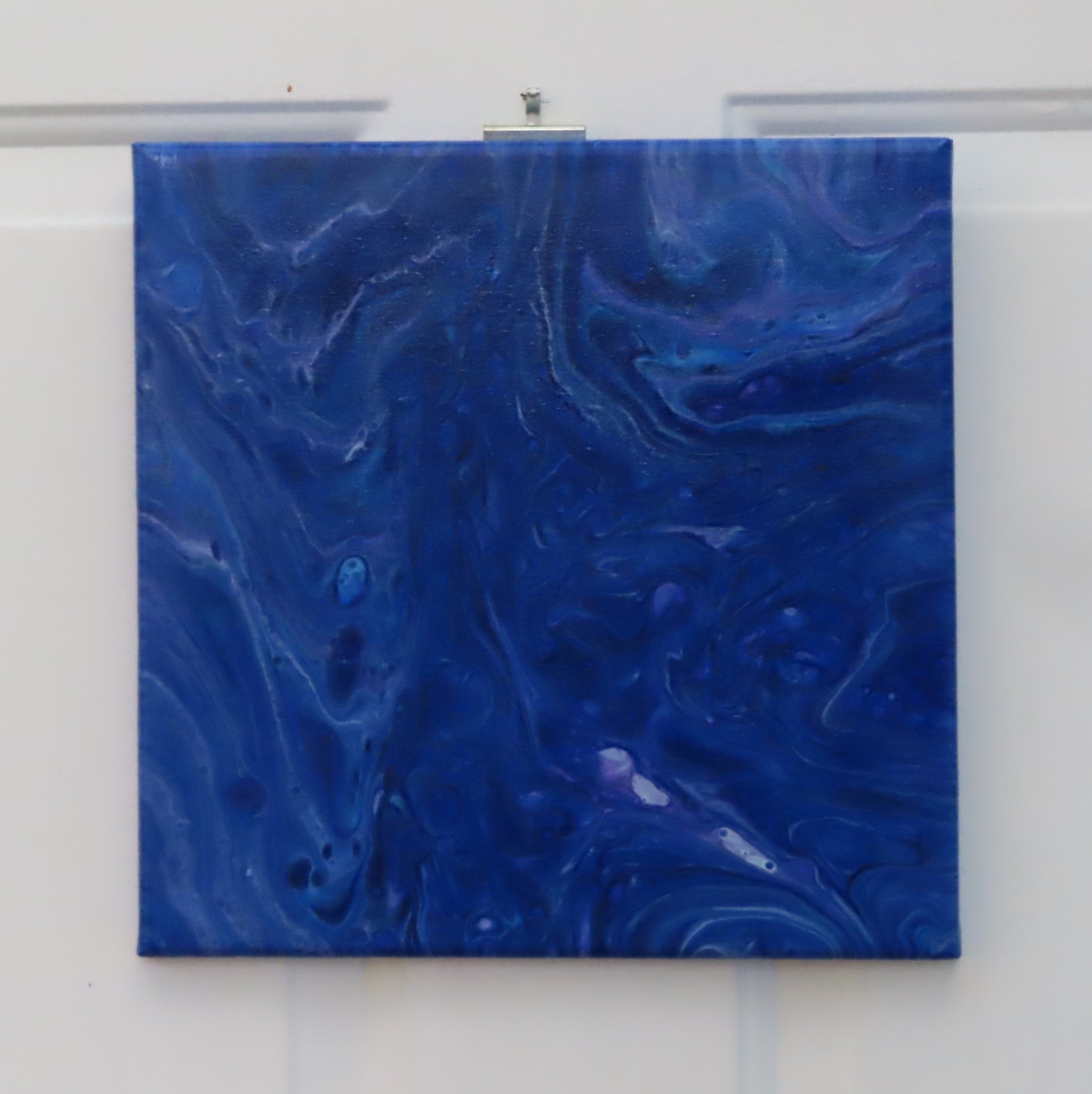 abstract acrylic liquid art on 12x12" canvas, rich blues, purples and white accents, hang in various orientations
