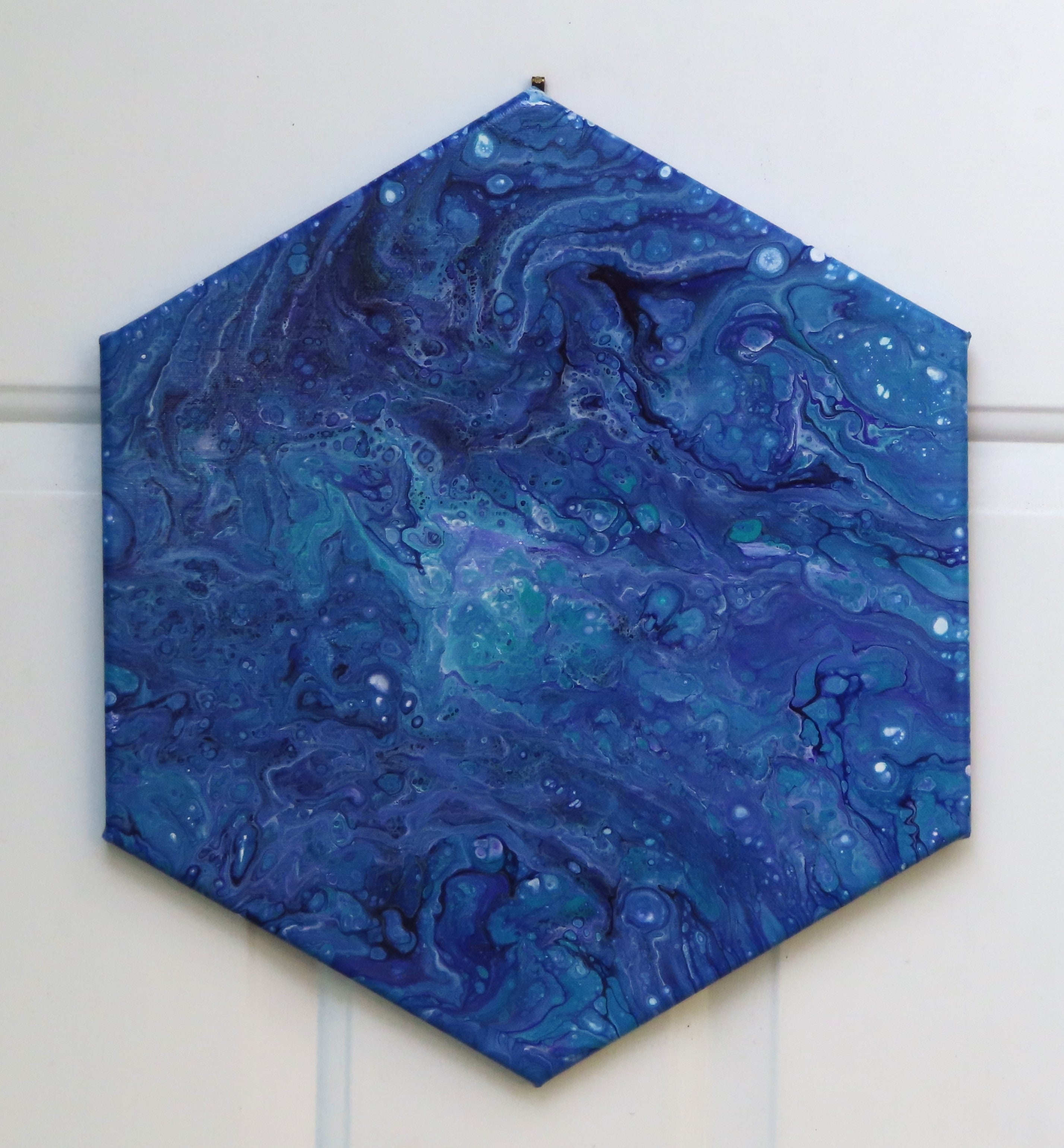 original acrylic abstract liquid art, blues, purples, white on hexagonal canvas, hung in different direction