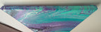 abstract liquid acrylic paint on 12x12" canvas, blues, greens and purples mix and flow in endless movement, can display in various directions, bottom side
