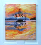 Original oil painting of a colorful pastel sky, the oranges, yellows and pinks contrast with the distant hills rising out of the mist and the dark silhouetted island and trees reflected in calm waters 24" tall by 20" wide unframed