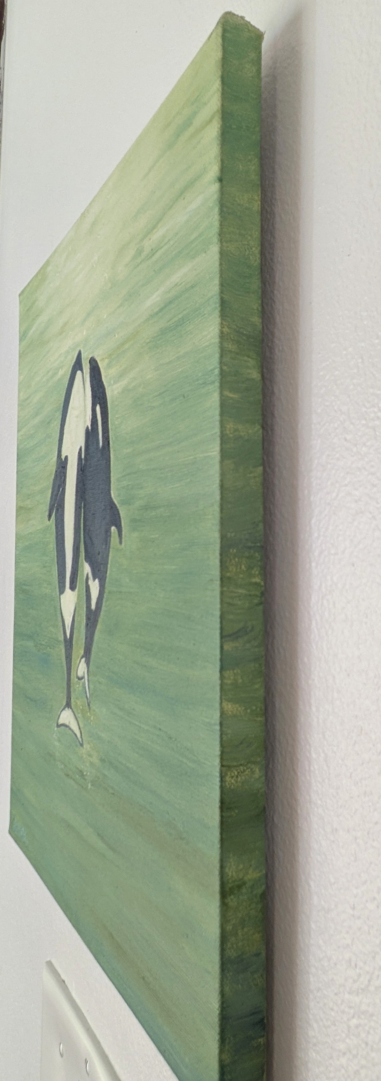 original oil painting, two orca whales  seem to dance to the surface of the ocean, unframed, showing painted right side