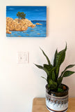 Original acrylic painting of island of Sardinia surrounded by ocean, painted on deep cradle canvas, displayed on wall over table