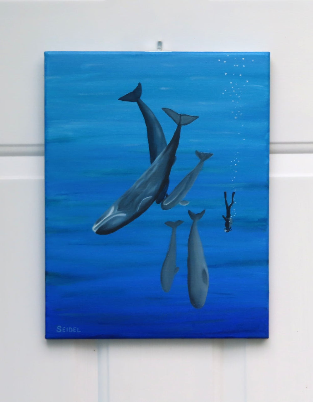 11x14 original oil painting of a scuba diver swimming with whales, unframed