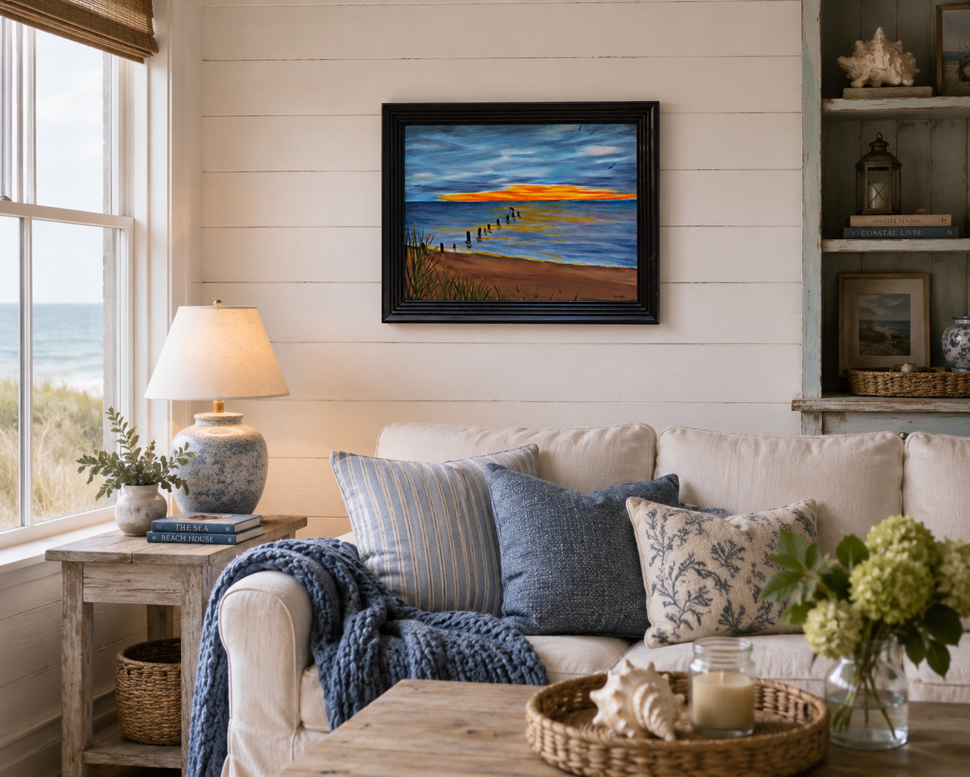 12x16 original oil painting of beach and sunset scene right after the rainstorm, pictured over sofa in seaide cottage
