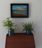 12x16 original oil painting of beach and sunset scene right after the rainstorm, pictured over secretary-desk
