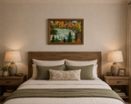original oil painting of bright fall colors, contrasting evergreens and waterfalls in walnut frame, displayed over bed