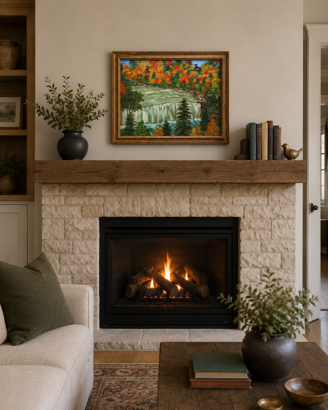 original oil painting of bright fall colors, contrasting evergreens and waterfalls in walnut frame, displayed over fireplace