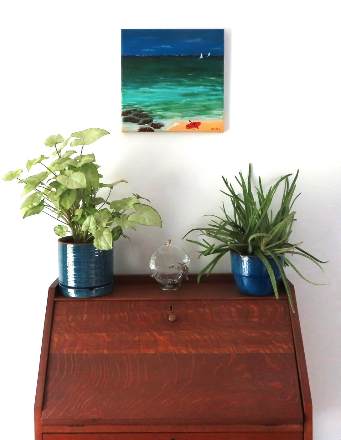 12x12" original acrylic painting, saiboats on ocean kayak on beach, storm has passed, shown over a secretary desk