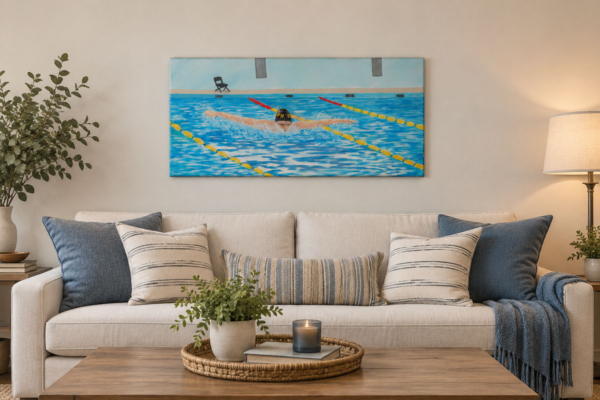12x24" original oil painting of a swimmer performing butterfly stroke, shown over a sofa