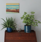 9x12 original oil painting, crane by the seashore pastel sky and reflections on the ocean, pictured over secretary desk