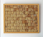 17x21" original wood framed corkboard, handmade with real wine corks, many from local Missouri wines. Blond wood, with a solid wood backboard. Sells with ideally sized pushpins.