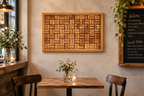 17x21" original wood framed corkboard, handmade with real wine corks, many from local Missouri wines. Blond wood, with a solid wood backboard. Sells with ideally sized pushpins. Shown in a cafe