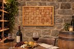 17x21" original wood framed corkboard, handmade with real wine corks, many from local Missouri wines. Blond wood, with a solid wood backboard. Sells with ideally sized pushpins. Shown in a winery