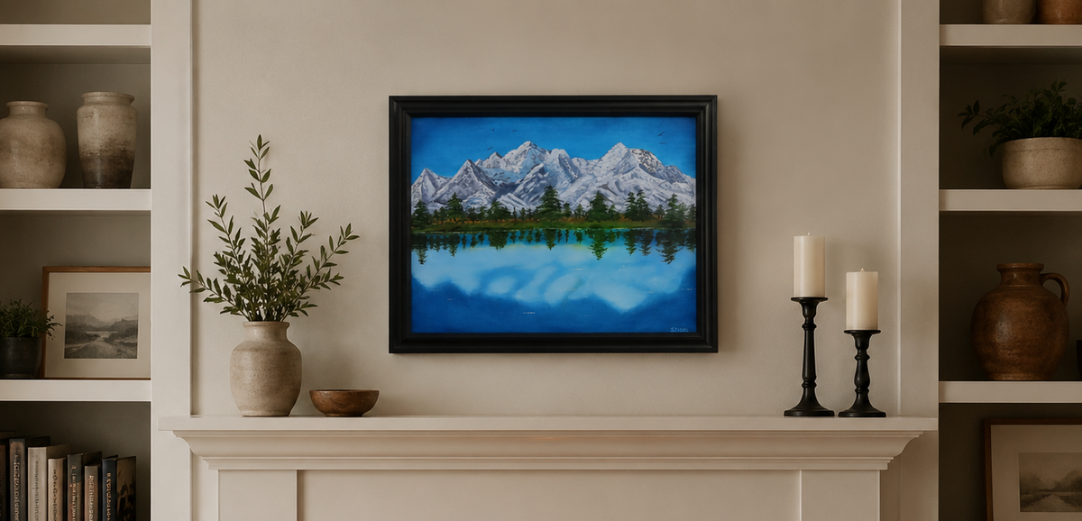 denali mountains painting above a fireplace