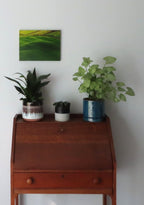 original 9x12 oil painting, green rolling hills 9x12" unframed, pictured ver secretary desk