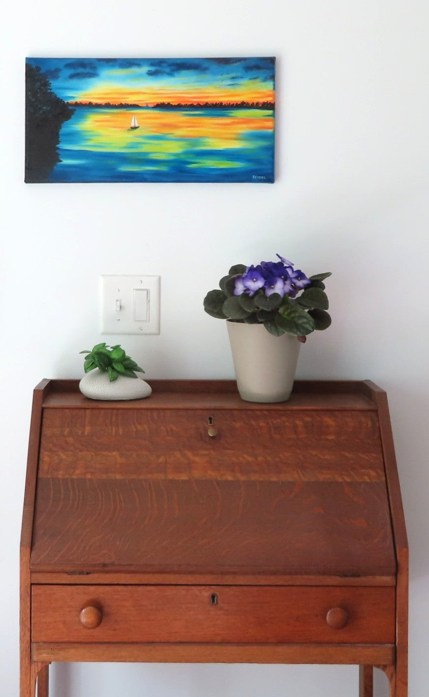 10x20" original oil painting,colorful sunset and reflections, sailboats, displayed over secretary desk