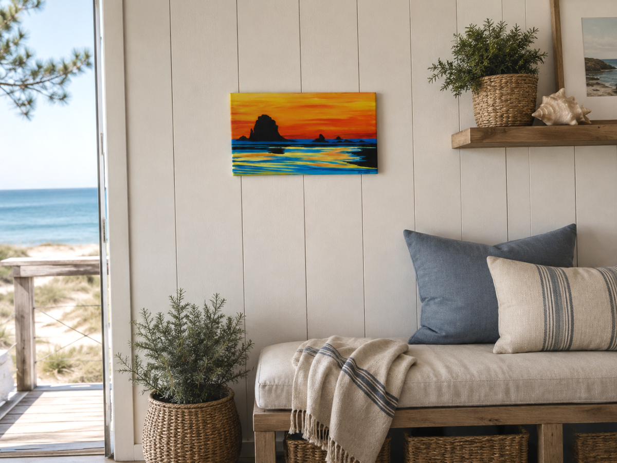 7x14" original acrylic painting of a brilliant sunset on ocean with large silhoutted sea stacks, shon in a seaside cottage