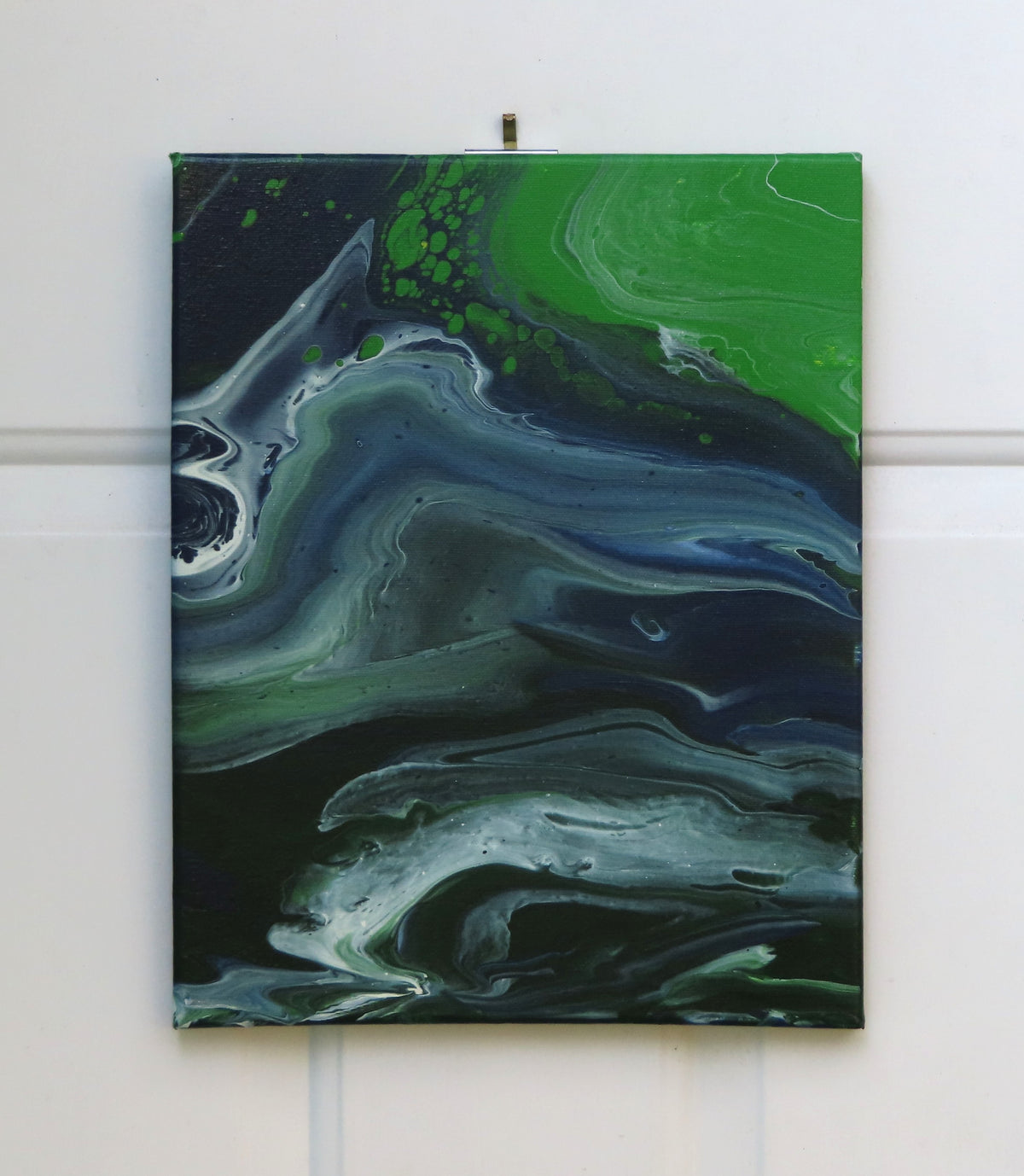 abstract poured acrylic painting on 11x14" canvas, flowing blues, greens and white create movement, painting can be displayed in two different directions. 