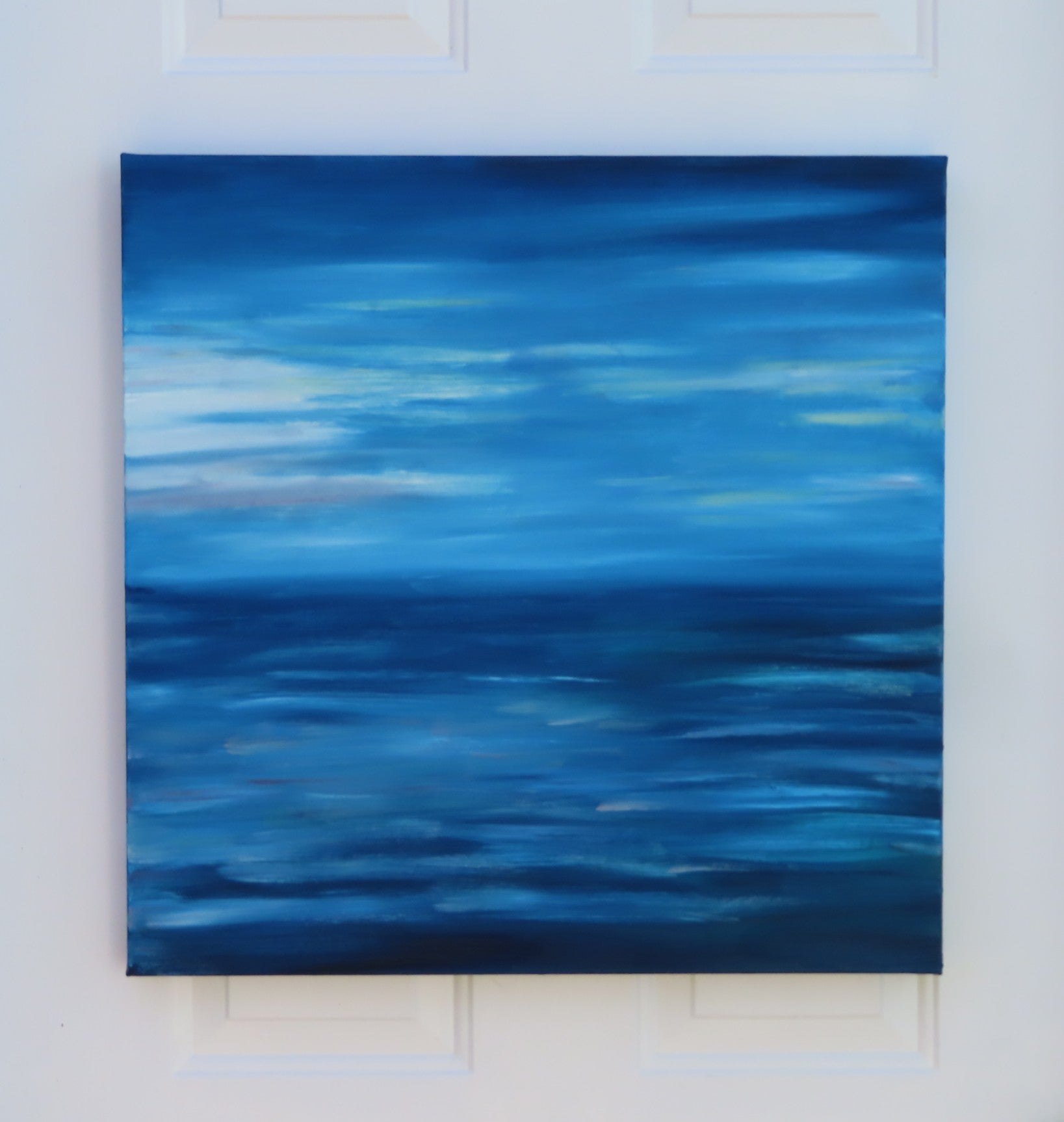 24x24" deep cradle original oil painting featuring an abstract serene blue ocean horizon with soft pastel sky
