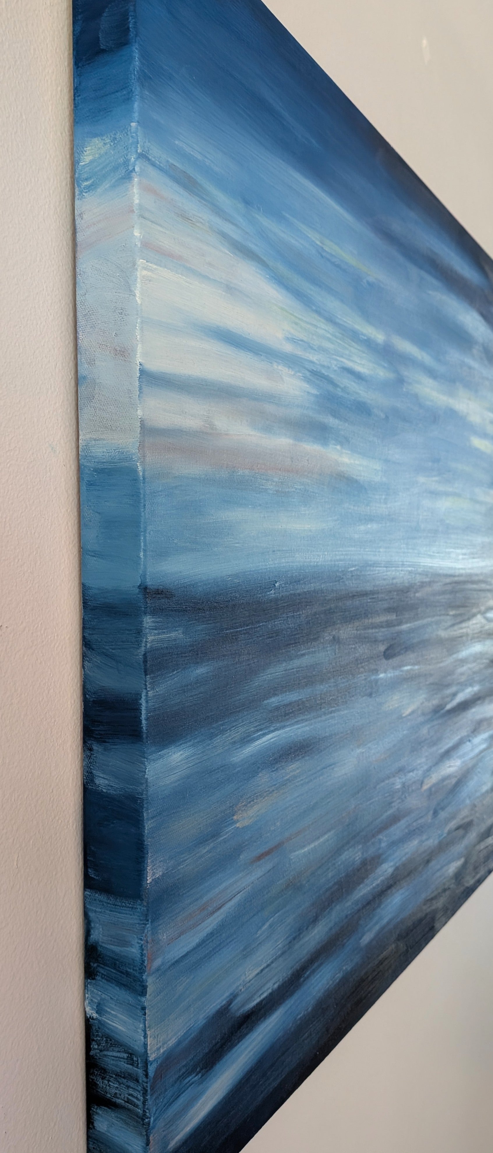 24x24" deep cradle original oil painting featuring an abstract serene blue ocean horizon with soft pastel sky,showing the painted left side