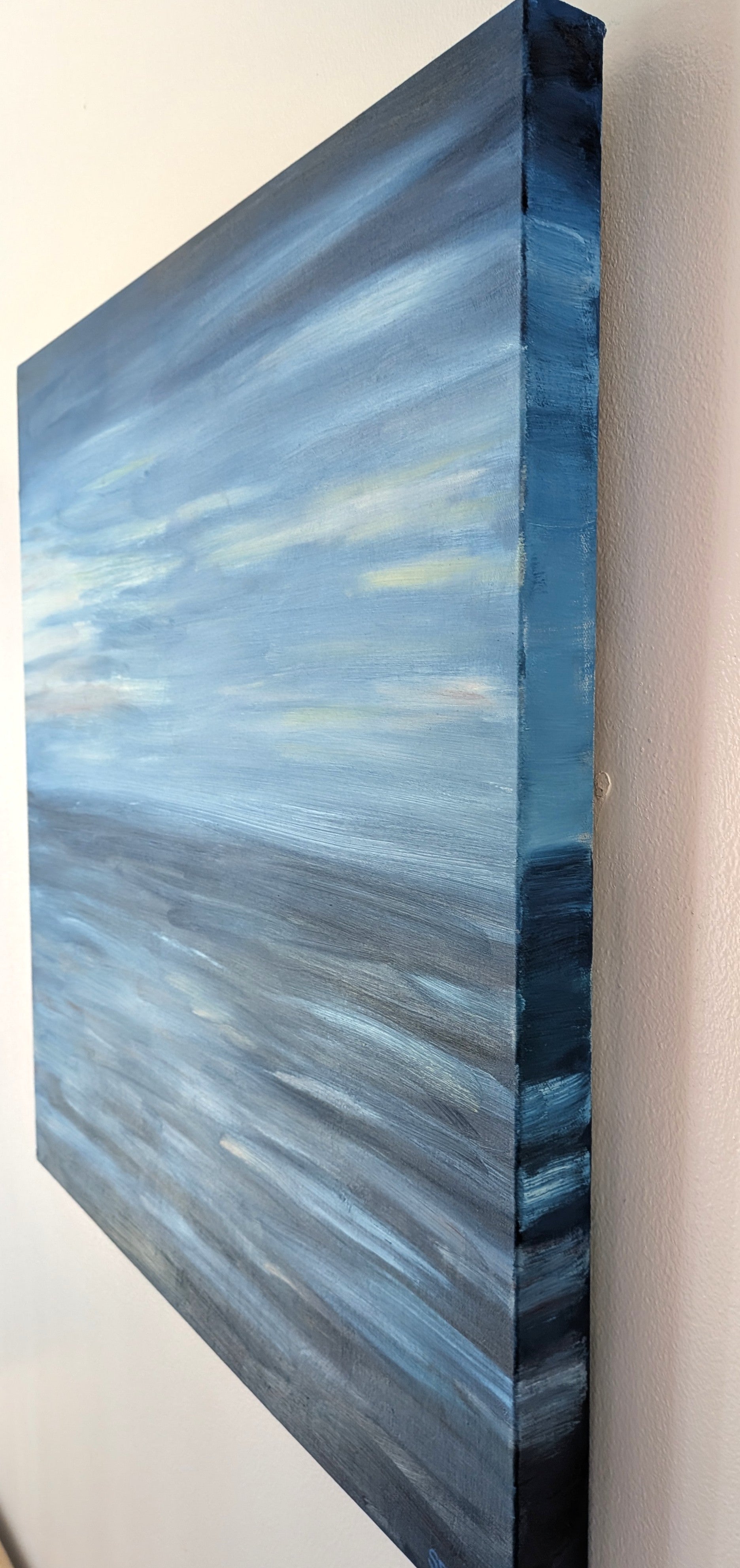 24x24" deep cradle original oil painting featuring an abstract serene blue ocean horizon with soft pastel sky, showing the painted right side