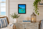 8x10" original acrylic-painting of two kayakers in a calm cove heading toward another island, beautiful turquoise water and blue sky, shown in a seaside cottage