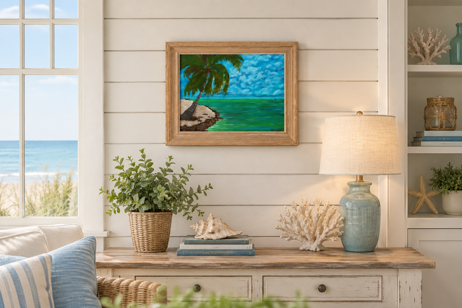 11x14" original oil painting of tropical island, kayakers on ocean, palm tree on sandy beach, framed, shown in a seaside cottage