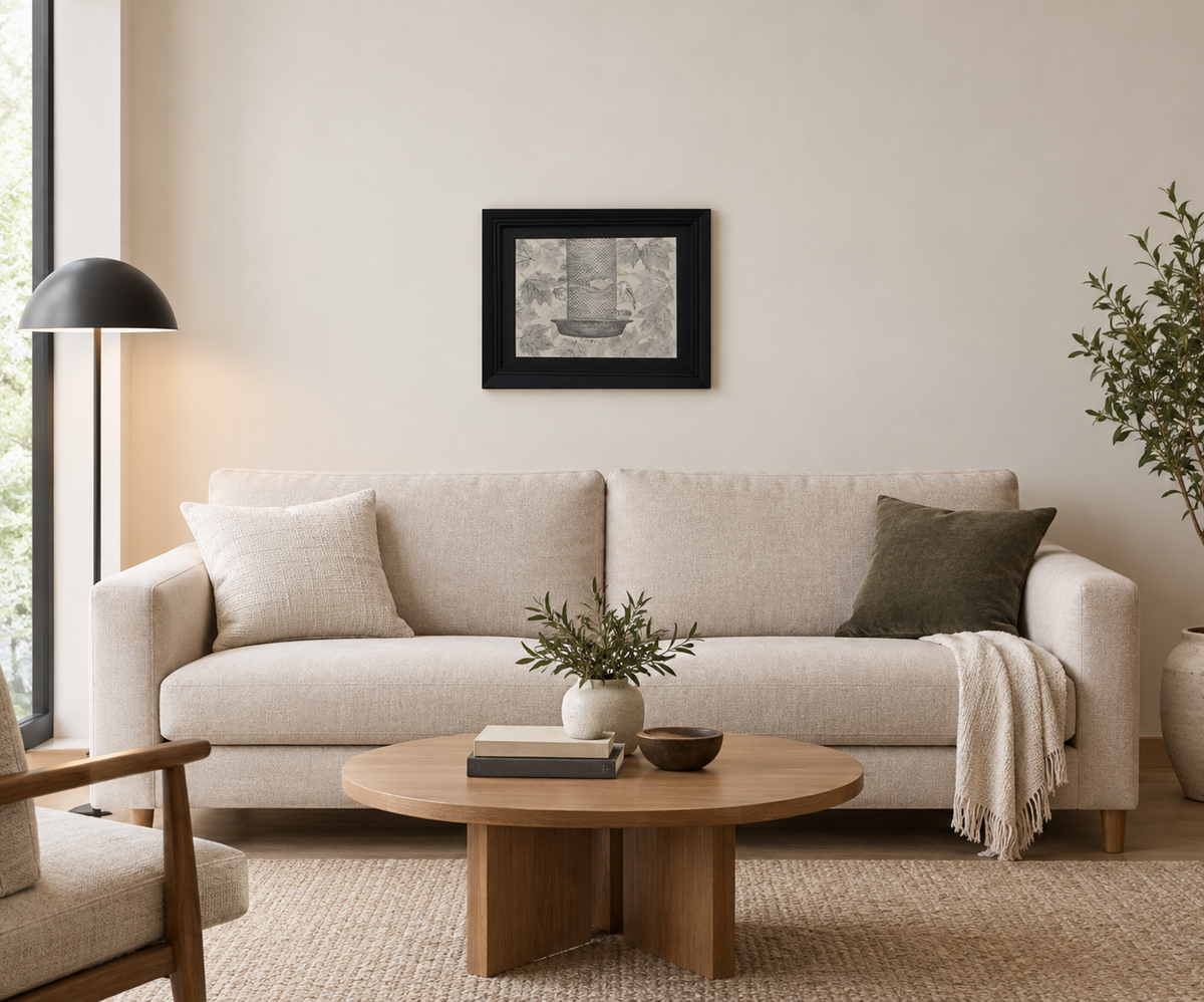 9x12 original graphite and charcoal drawing, black mat and frame, shown over a sofa