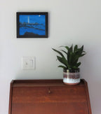 8x10" original acrylic painting, sea, rocks, lighthouse, moon, misty atmosphere, framed, shown over a secretary desk