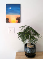 original oil painting on 11x14" canvas with lovely colors of dusk and rising moon, two observers on cliffs in foreground shown over table