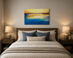 an original oil painting of a lovely sunrise over the ocean, unframed, displayed over bed