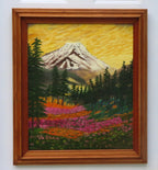 original oil painting of Mt Rainier with evergreen trees, wildflowers and meadows in foreground. framed