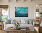 Ocean Dreams original abstract  oil painting on 24x30"canvas with beautiful blue, green water, small headlands, clouds in impasto style, handmade black surround frame, pictured over sofa