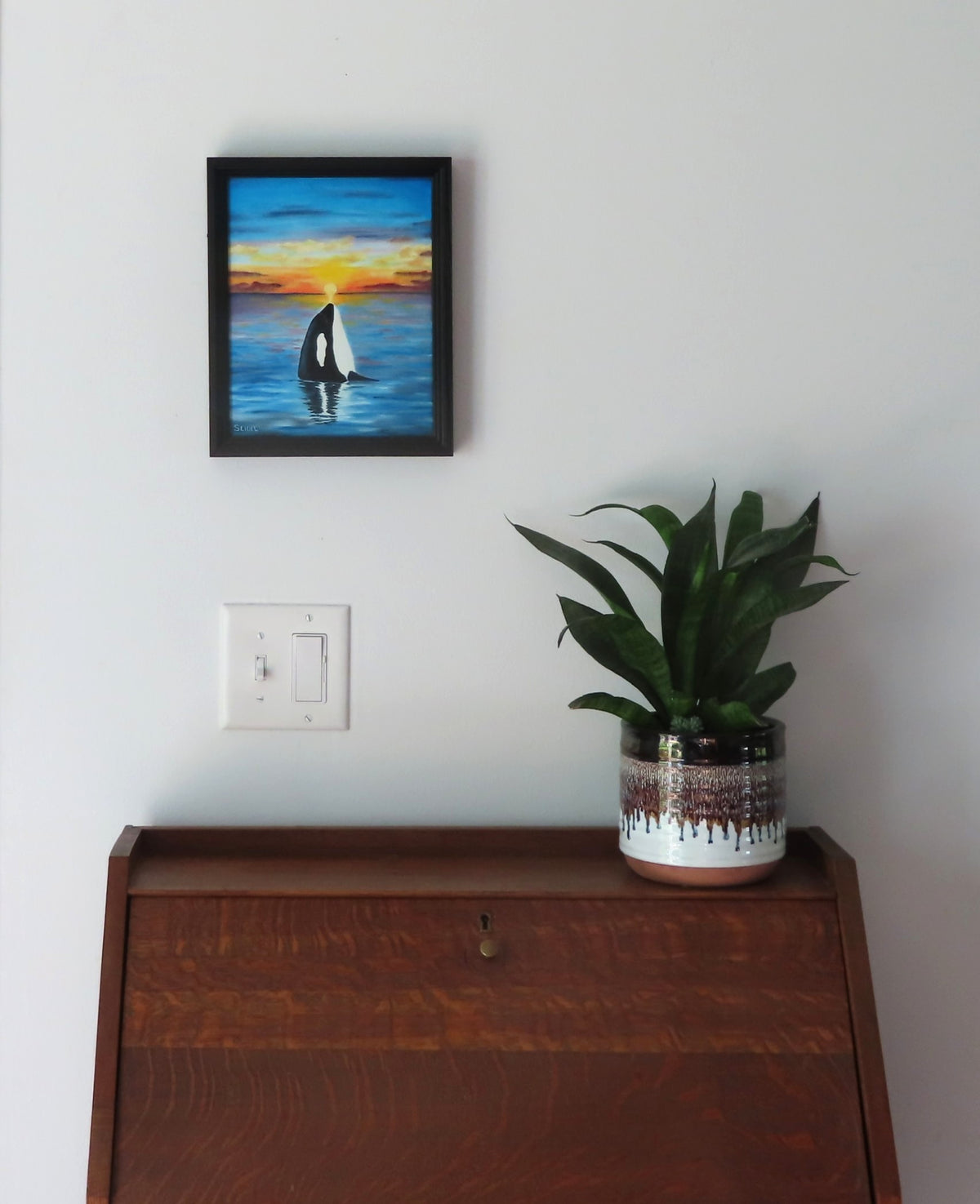 original 8x10 oil painting, orca whale seems to watch sunset, framed, shown over secetary desk, alternate setup