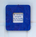 This 7 3/4"- wide by 8" tall has a 3 1/4" by 3 1/4" window for an inspirational quote or a photo of your choice. It is solid wood with an original acrylic poured painting with blues and purples.