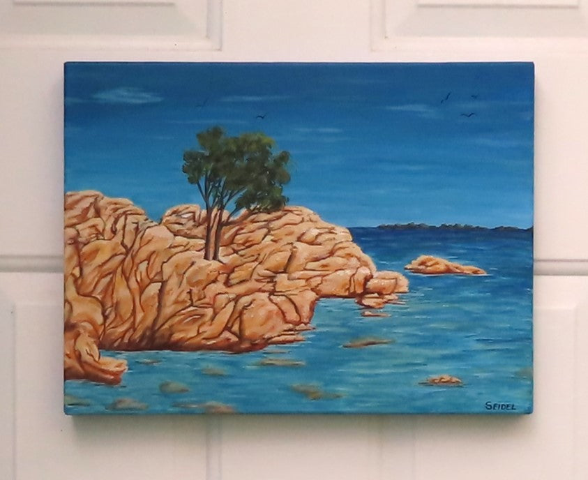 12x16 Original acrylic painting of the island of Sardinia surrounded by ocean, painted on deep cradle canvas, displayed on white wall