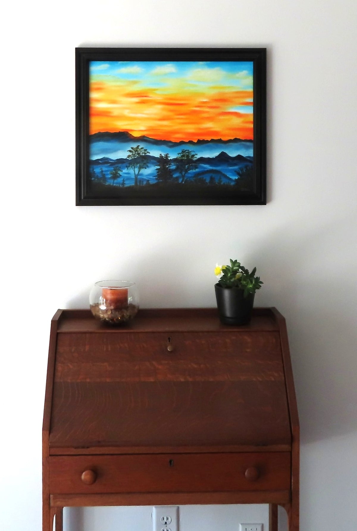 16x20" original oil painting, brilliant sunrise over misty mountains and trees, framed, shown over secretary desk