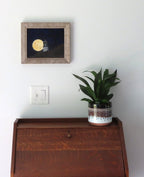 8x10" Original oil painting on panel, super moon rising behind lighthouse on a Hawaiian mountain, specialty framed, shown over a secretary desk