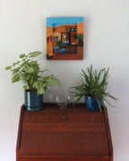 12 1/2 x 14" Original oil painting on wood, mixed media, 3 dimensional, painting continues onto frame, shown over a secretary desk