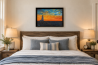 11x14" colorful sunset over ocean, rocky coast, lighthouse, shown over a bed