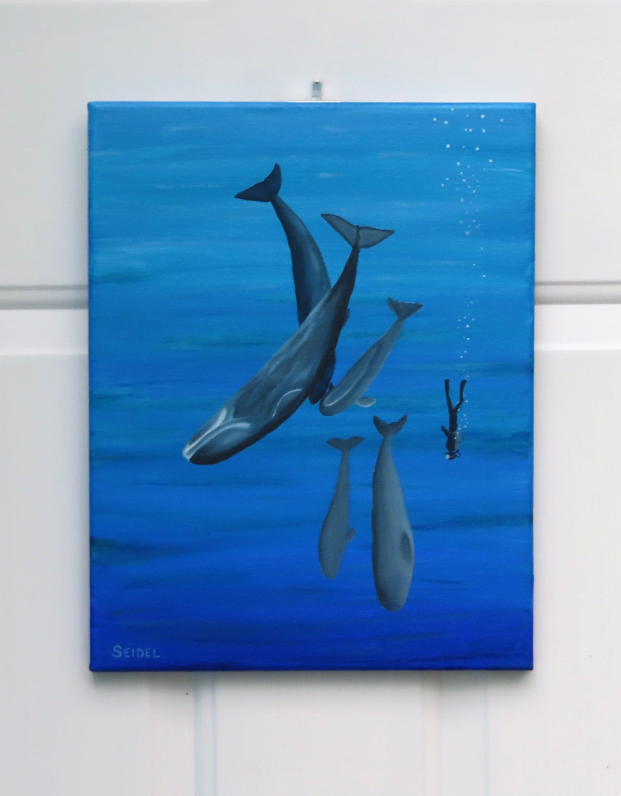 11x14 original oil painting of a scuba diver swimming with whales, unframed