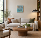 10x10" original liquid acrylic painting on canvas, multiple blues and peach colors with an inspirational scripture and a special symbol meaning Truth. It is shown here in a modern livingroom