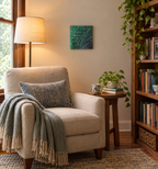8x8" canvas with liquid art acrylic and inspirational quote. Colors are multiple greens with purple and gold accents, shown in a reading-nook