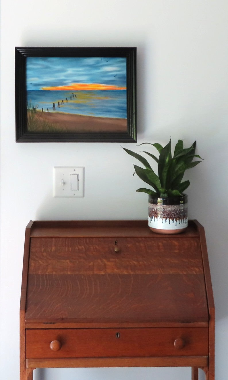 11x14 original oil painting, kayakers on ocean at sunset, framed, shown over secretary desk
