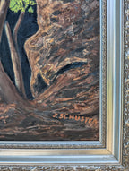 An original 16x20 oil painting on canvas featuring a lone tree with bright green leaves, illuminated by sunlight, with a dark, mysterious background and a rocky cavern, displayed in an ornate wood frame, signature