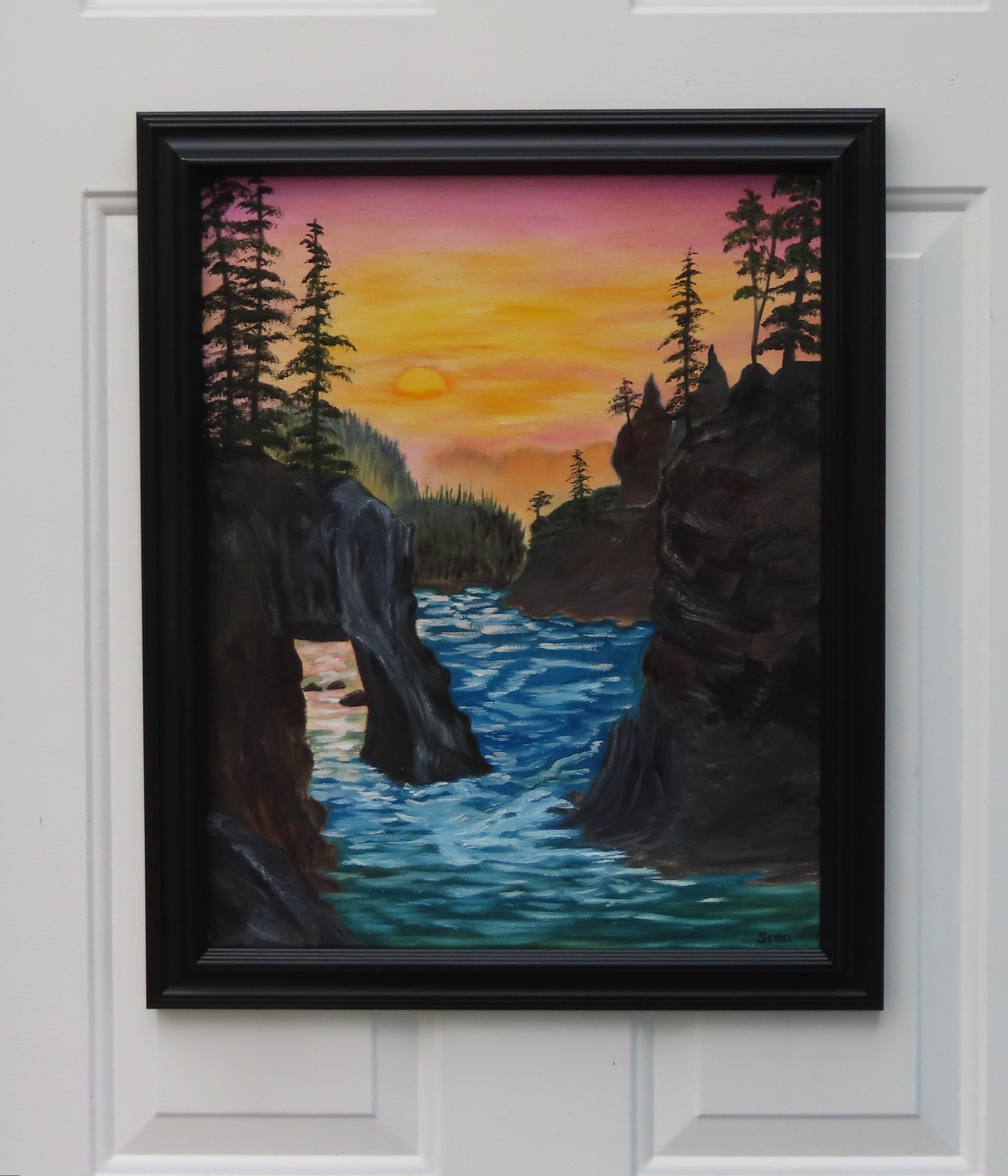 original oil painting, rugged coastline, ocean, lovely sunset and reflection, framed in modern black frame