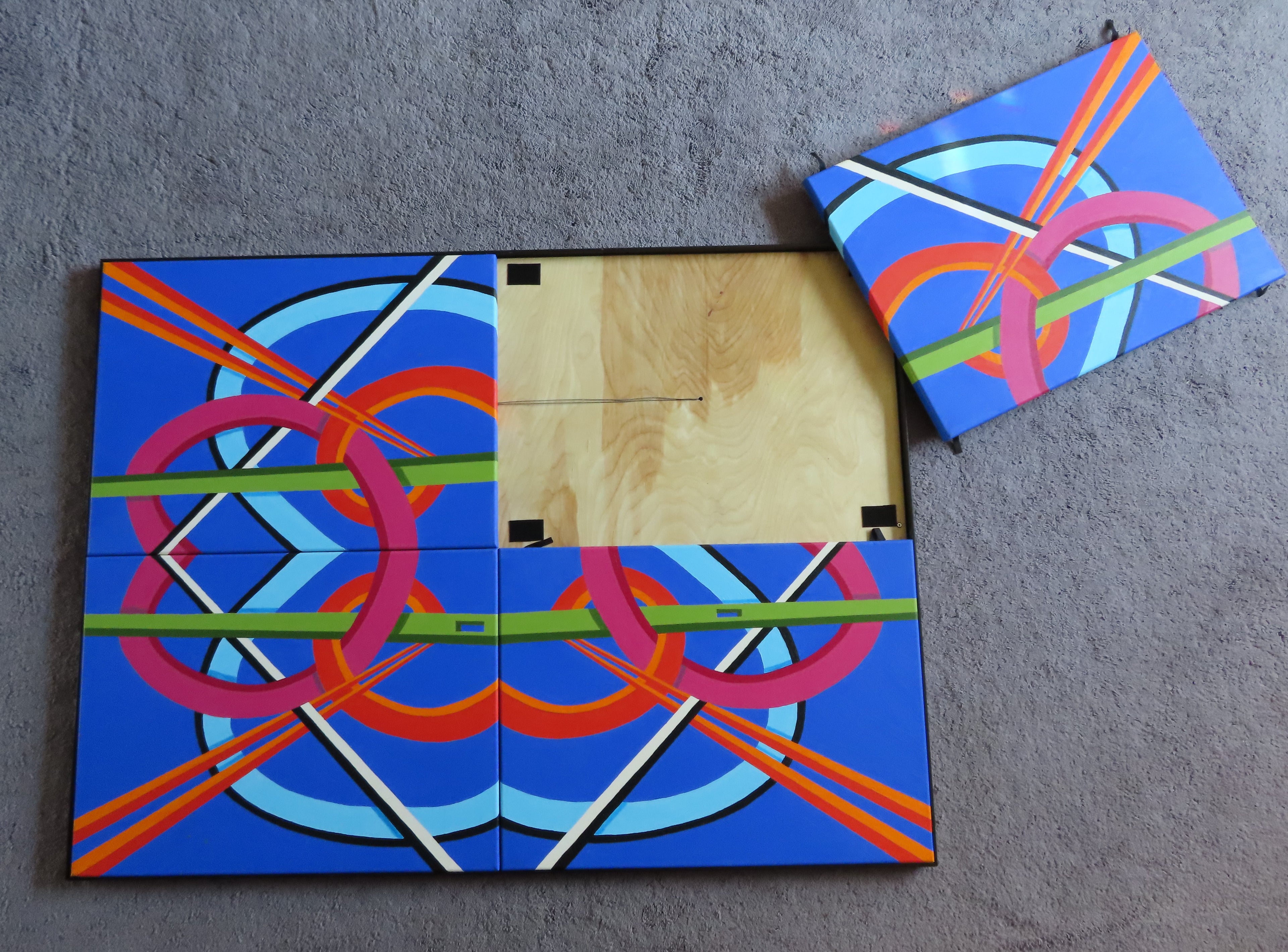 original abstract oil painting, 4 canvases complete the brightly colored geometric design, in a black surround frame, the canvases are easily removed and reassembled